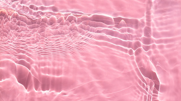 Fondo de naturaleza de verano abstracto de moda textura de superficie de agua clara de color rosa líquido
