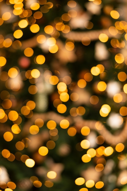 Foto fondo de navidad abstracto oro defocused. textura bokeh. 2022 año nuevo.