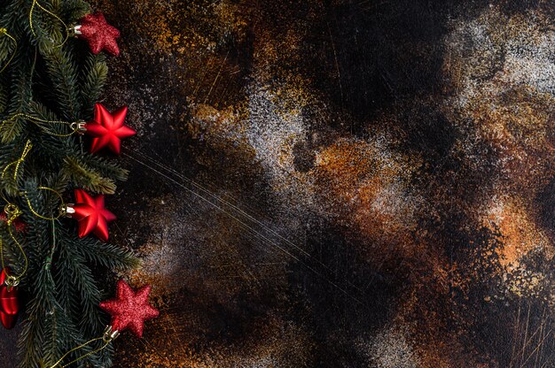 Fondo de Navidad, estrellas rojas sobre negro