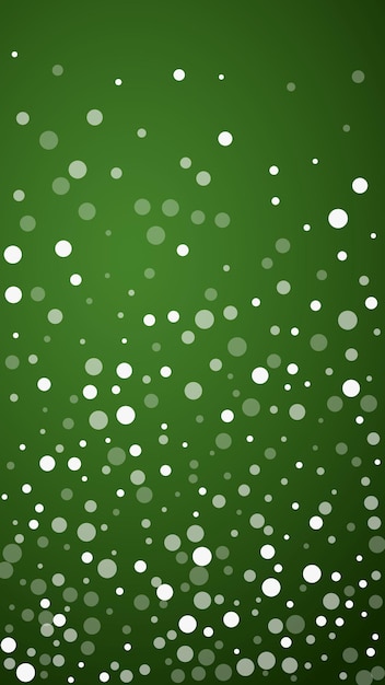 Foto fondo de navidad nevado subtiles copos de nieve voladores y estrellas en el fondo verde de navidad delicada dulce navidad nevada ilustración vectorial vertical