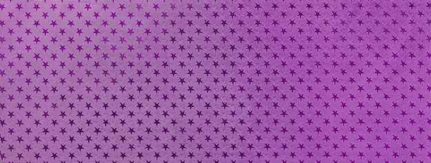 Fondo de navidad violeta oscuro de papel de aluminio con un patrón de estrellas brillantes macro Telón de fondo púrpura