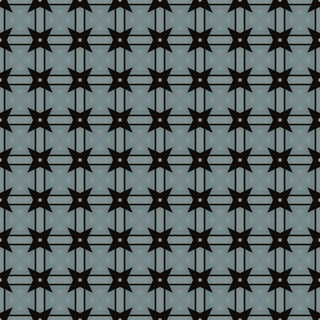 Un fondo negro y gris con un patrón de estrellas.