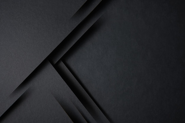 fondo negro hojas negras de papel maqueta negra formas geométricas triángulos esquinas afiladas