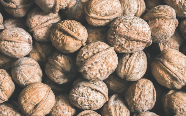 Fondo de nueces. Textura de frutos secos. Comida vegana de energía saludable. Superalimento para el estilo de vida hipster.