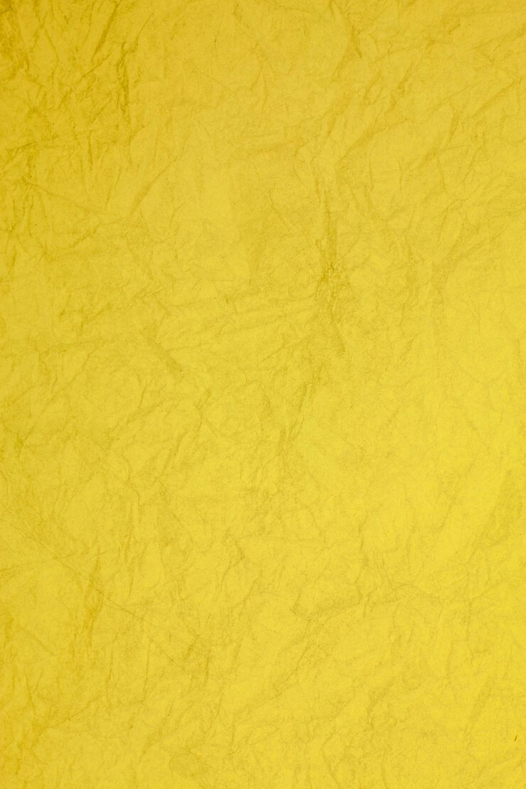 Fondo obsoleto con textura de papel amarillo vintage arrugado.