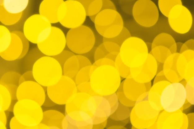 Fondo de oro hermoso del bokeh. Resumen.