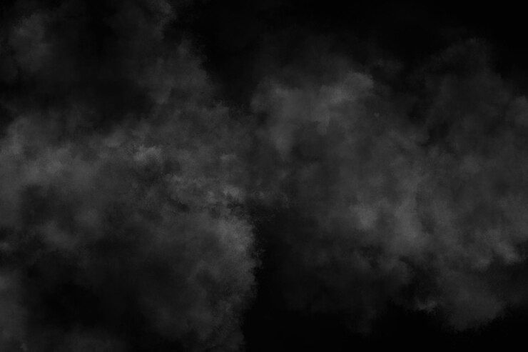 un fondo oscuro con una nube negra y blanca en el medio