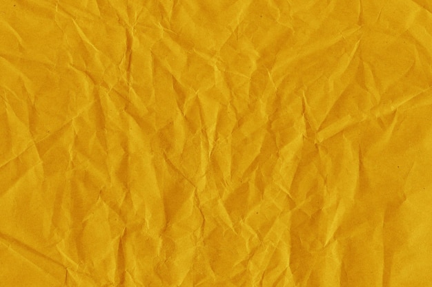 Fondo de papel arrugado de aspecto vintage y antiguo amarillo