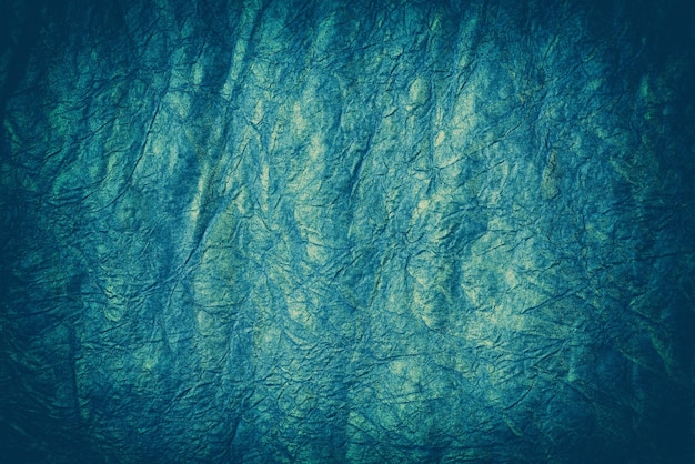 Fondo de papel arrugado azul grunge