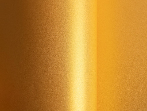 Fondo de papel de azafrán dorado con una textura brillante de perlas y reflejos relucientes