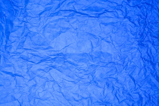 Fondo de papel azul con textura.