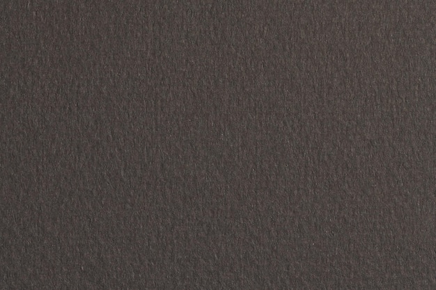 Fondo de papel kraft rugoso textura de papel monocromo color negro Mockup con espacio de copia para texto