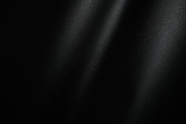 Fondo de papel negro con luz para agregar letras