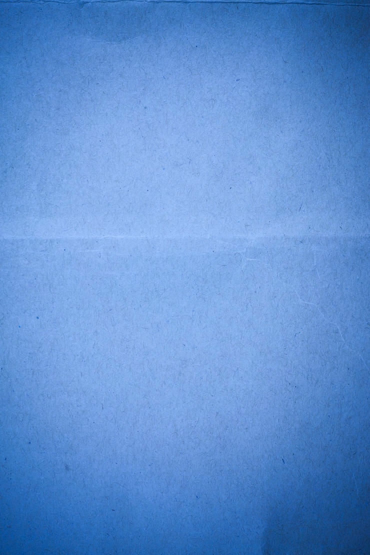 Fondo de papel reciclado azul.