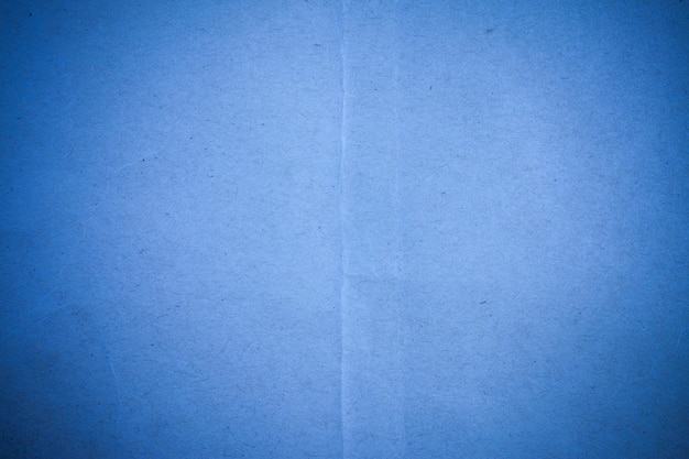 Fondo de papel reciclado azul.