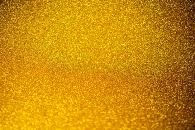 Fondo de papel de regalo brillante con textura de brillo dorado para la decoración de papel tapiz de temporada de vacaciones de Navidad