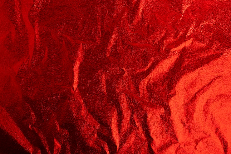 Foto fondo de papel rojo textura de piel animal.