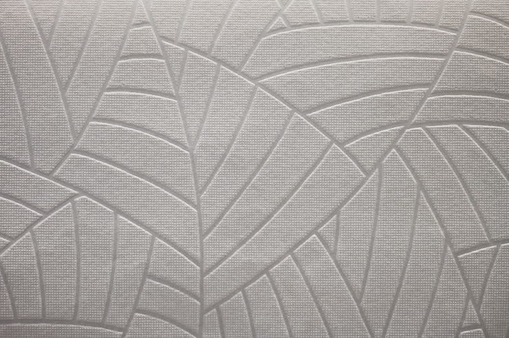 Fondo de papel tapiz beige texturizado antiguo.