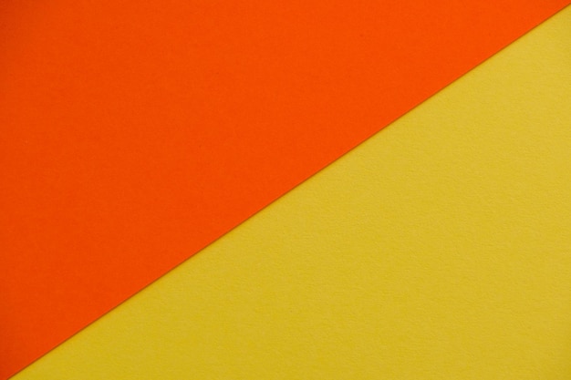 Fondo de papel texturizado amarillo y rojo