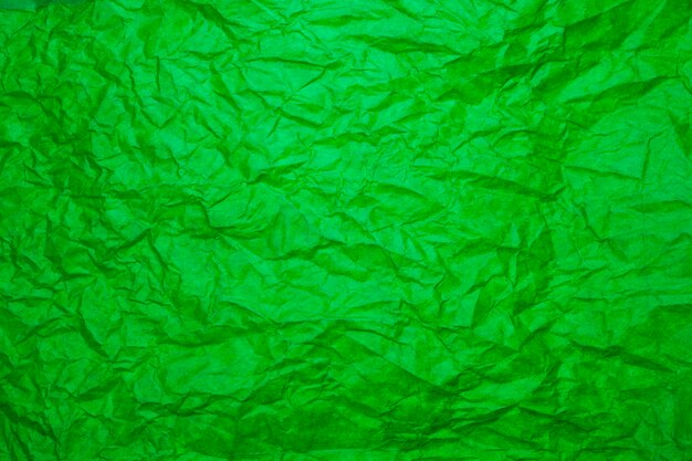 Fondo de papel verde con textura.