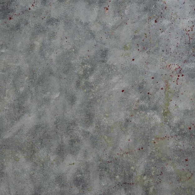 Fondo de pared abstracto con textura gris con algunos puntos de color óxido.