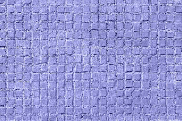 Fondo de pared de azulejos con textura púrpura, color muy peri del año 2022