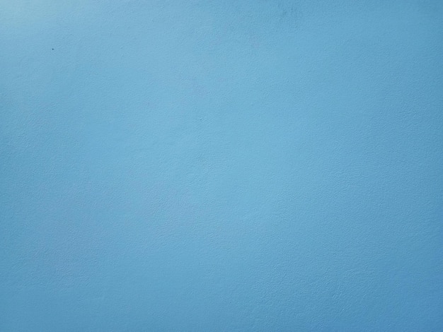 Fondo de pared de cemento azul de superficie lisa en estilo vintage para diseño gráfico o papel tapiz