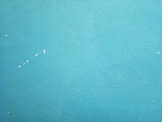 Fondo de pared de cemento azul de superficie lisa
