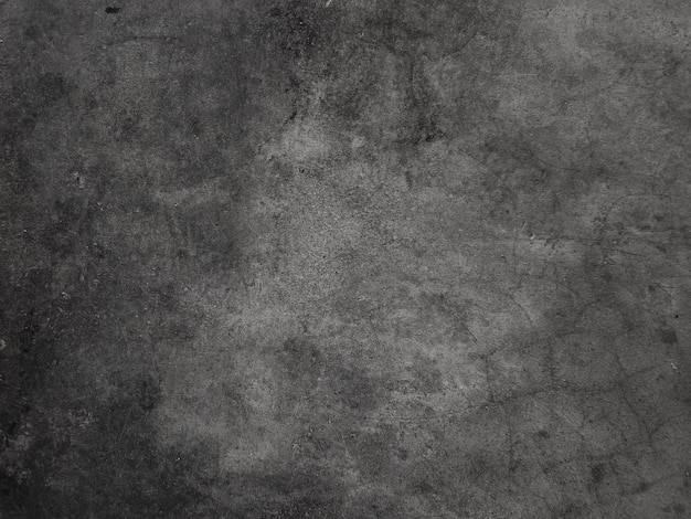 Fondo de pared de cemento oscuro en estilo vintage para diseño gráfico o papel pintado El patrón del piso de hormigón está envejecido en un concepto retro