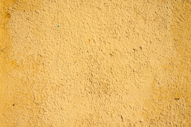 Fondo de pared de estuco de color amarillo muy detallado