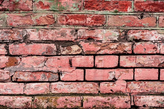 Fondo de pared de ladrillo de albañilería de textura. Textura de ladrillo con arañazos y grietas