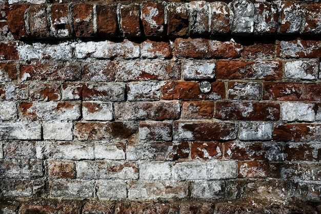 Fondo de pared de ladrillo antiguo / fondo vintage abstracto, piedras vintage, textura de ladrillos