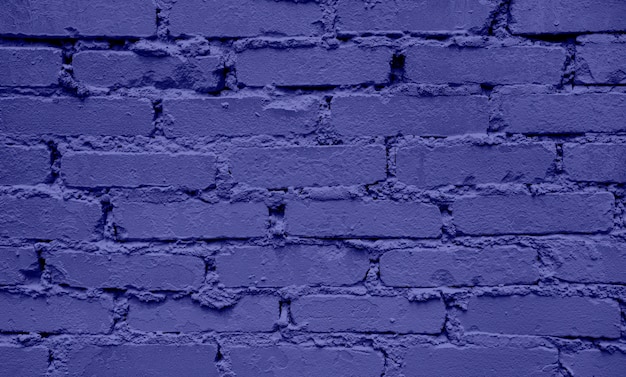 Foto fondo de pared de ladrillo de color veri peri. color de moda