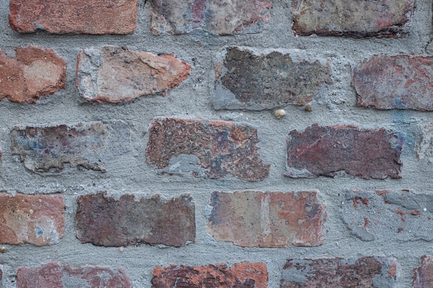 Fondo de pared de ladrillo gris y marrón