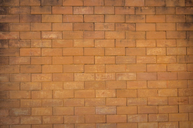 Fondo de pared de ladrillo naranja