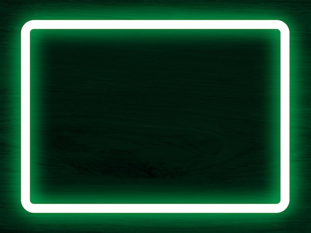 Fondo de pared de madera oscura luz de neón verde y marco rectangular