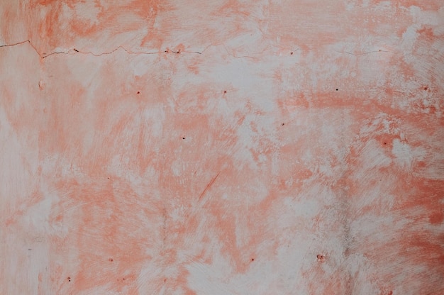 Fondo de una pared con masilla de construcción y agujeros de tornillos