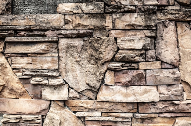 Fondo de pared de piedra apilada