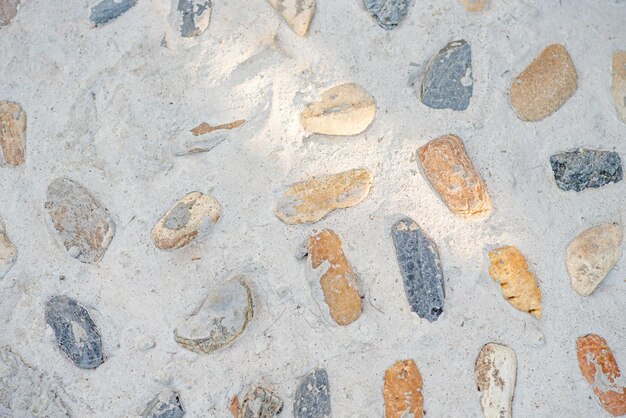 Fondo de pared de piedra gris, paredes de cemento y piedra en la playa