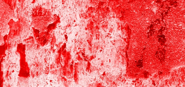 Fondo de pared roja agrietada textura de pared sangrienta de miedo pared blanca con salpicaduras de sangre para fondo de concepto de horror o halloween