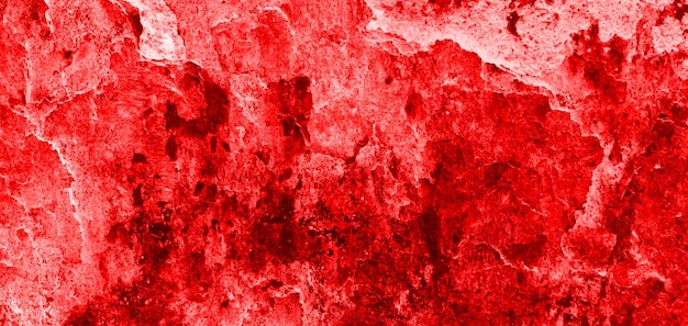 Fondo de pared roja agrietada textura de pared sangrienta de miedo pared blanca con salpicaduras de sangre para fondo de concepto de horror o halloween