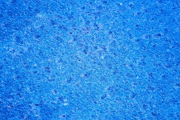 Fondo de pared con textura de piedra rústica azul, pared en blanco abstracta en mal estado
