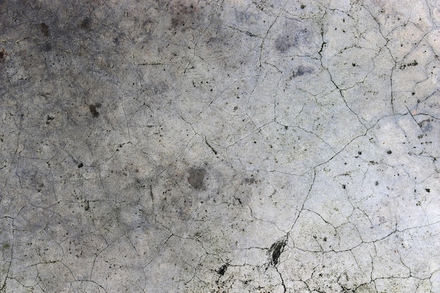 Fondo de pared de yeso de piedra de hormigón agrietado envejecido y estilo de textura