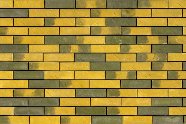 Fondo de patrón de construcción de pared de ladrillo amarillo vintage