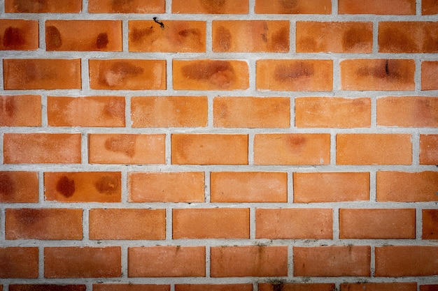 Fondo de patrón de pared de ladrillos de piedra marrón antiguo de pared de ladrillo