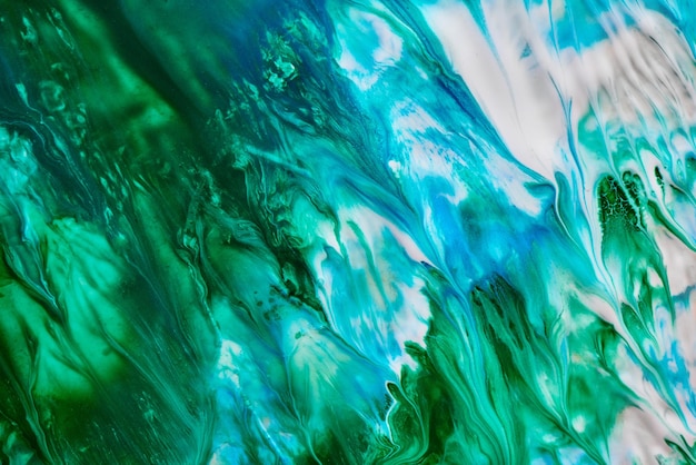 Fondo de patrón verde azul fluido abstracto Olas marinas cósmicas manchas de pintura arte líquido creativo Colores del planeta tierra