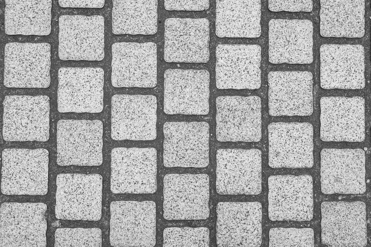 Fondo de pavimento de adoquines de granito.