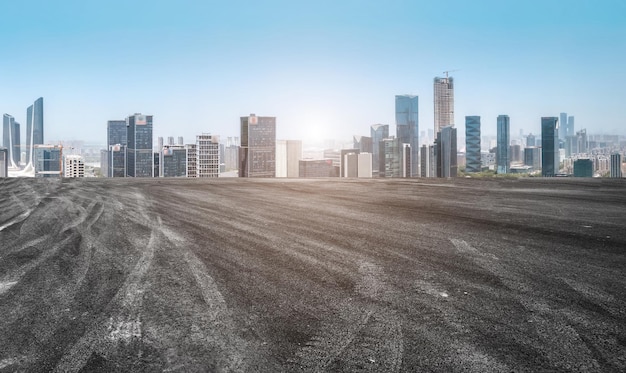 Fondo de pavimento de asfalto y horizonte de paisaje arquitectónico urbano