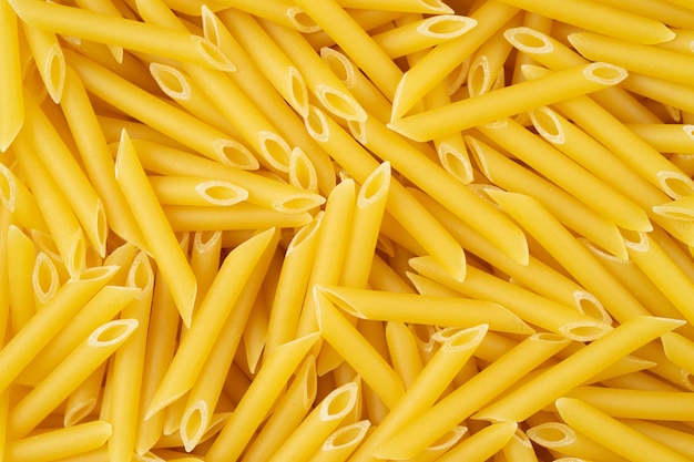 Fondo de pennettine de pasta italiana Vista superior de cerca