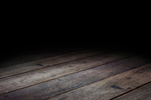 Foto fondo de perspectiva de textura de piso de madera de tablón oscuro para exhibición o montaje de producto